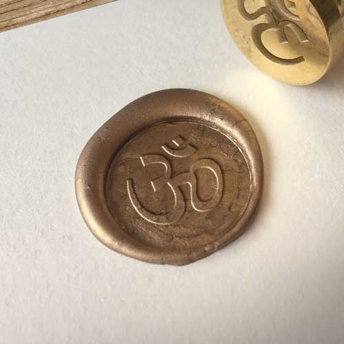 om symbol wax seal