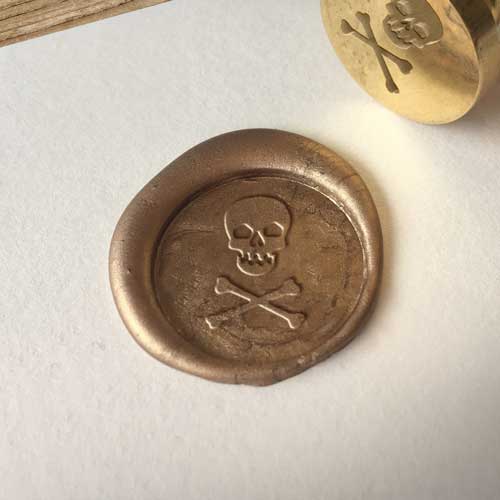 skull and crossbones wax seal